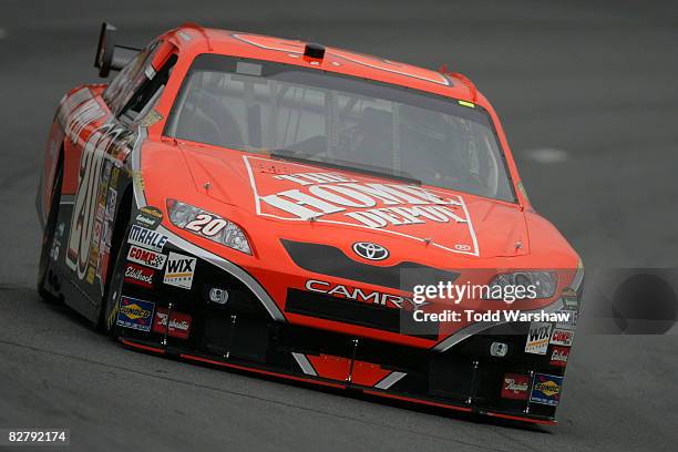 Tony Stewart, driver of the Home Depot Toyota, drives during practice for the NASCAR Sprint Cup Series Sylvania 300 at New Hampshire Motor Speedway...