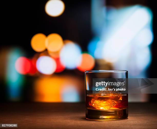 whisky in night background - scotch whisky stock-fotos und bilder