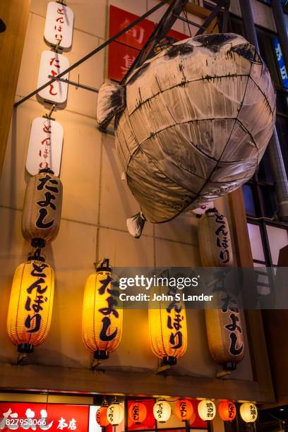 Dotombori Blowfish Restaurant - Dotonbori is a district of Osaka famous for its neon and mechanized signs, most famously for the sign of the candy...