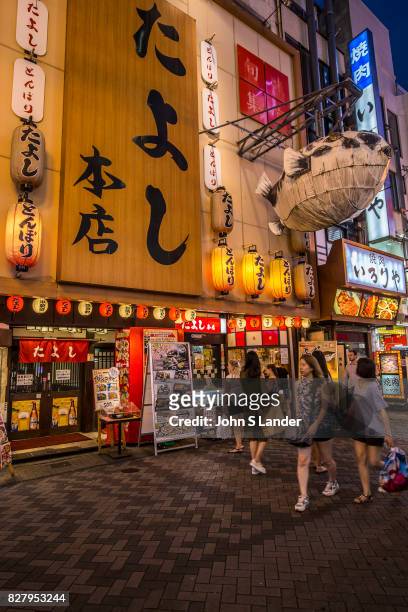 Dotombori Blowfish Restaurant - Dotonbori is a district of Osaka famous for its neon and mechanized signs, most famously for the sign of the candy...