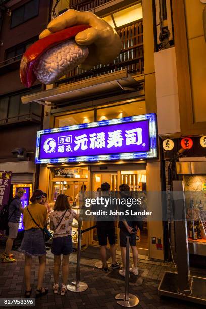 Dotombori Sushi Restaurant - Dotonbori is a district of Osaka famous for its neon and mechanized signs, most famously for the sign of the candy...