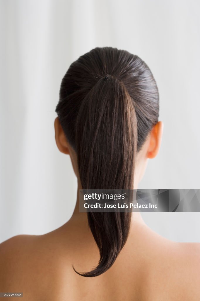 Mixed race woman's ponytail