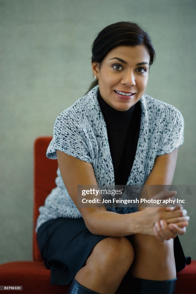 Indian woman sitting in chair