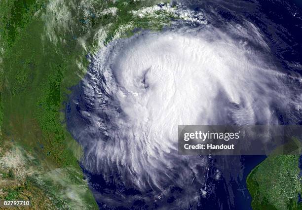 In this handout from the National Oceanic and Atmospheric Administration , Hurricane Ike churns in the Gulf of Mexico at 15:55 GMT September 12,...