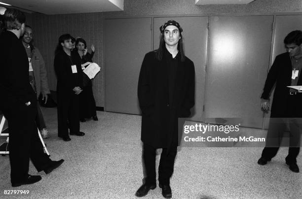 American fashion photographer Steven Meisel, center, backstage at the VH1 Fashion Awards in October 1998 in New York City, New York.