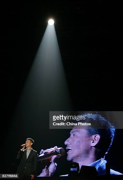 Hong Kong singer Jacky Cheung performs during a concert marking the 52nd birthday of the late Hong Kong pop singer and actor Leslie Cheung September...