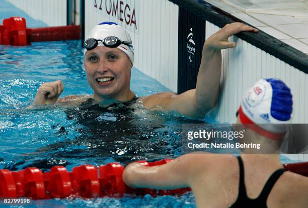 Stephanie Millward of Great Britain smiles after competing in the women's 100M backstroke S9 heat heat Swimming event at the National Aquatics Centre...