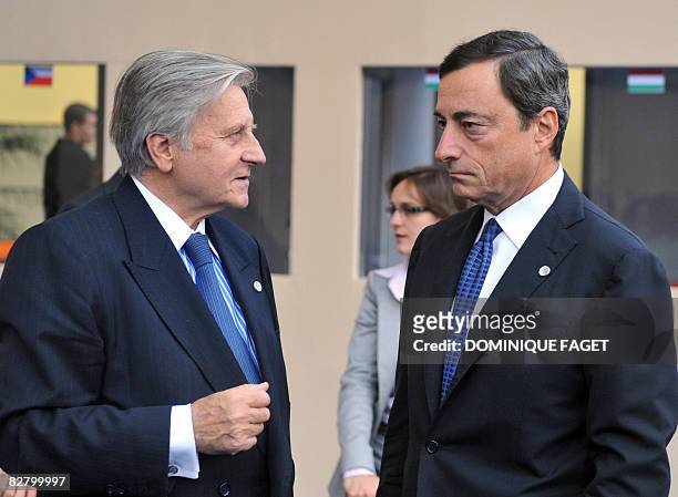 Jean-Claude Trichet, president of European Central Bank talks with Governor of the Bank of Italy, Mario Draghi on September 13 before a meeting of...