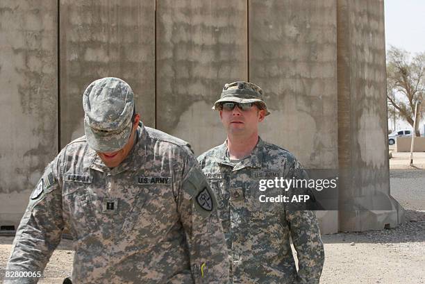 Soldier Staff Sergeant Hal Warner is seen walking following the first day of his two day court hearing at the Contingency Operating Base Speicher,...