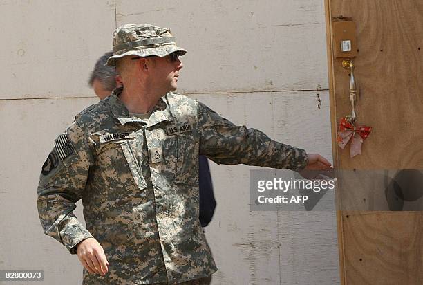 Soldier Staff Sergeant Hal Warner is seen leaving the courtroom following the first day of his two day court hearing at the Contingency Operating...