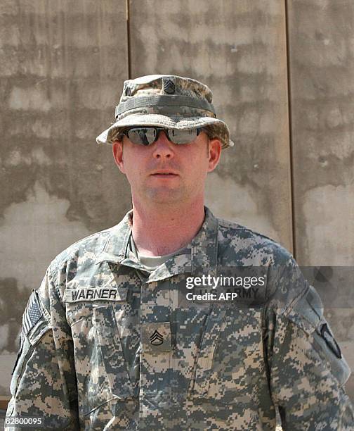 Soldier Staff Sergeant Hal Warner is seen leaving the courtroom following the first day of his two day court hearing at the Contingency Operating...