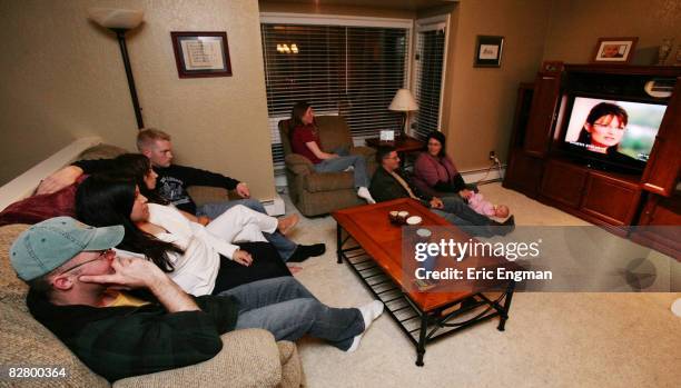 Richard and Beka Zerbst, Hosanna and Joel Johnson, Tricia and Gabe Austin, and Gabe's sister Ginny Austin, gather in the living room of the Austin...