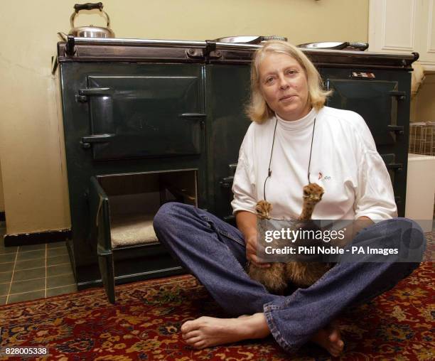 Penny Boyd from Knowsley Safari Park, Merseyside, with Harry and Houdini, the baby Ostriches rescued by keepers after their nest had been abandoned...