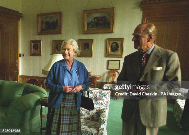 Britain's Queen Elizabeth II and the Duke of Edinburgh wait to receive the President of Malta, Dr Edward Fenech-Adami and his wife, Mary at Balmoral...