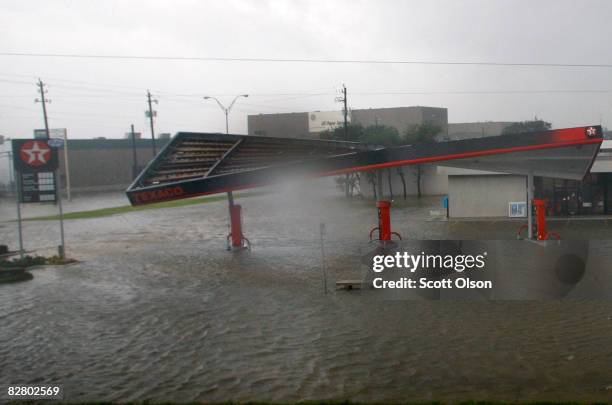 Gas station is wind damaged and flooded by Hurricane Ike September 13, 2008 near Houston, Texas. Ike made landfall near Galveston, TX early today as...