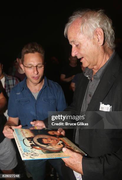 Bill Murray signs autographs backstage at the hit musical based on the 1993 Bill Murray film "Groundhog Day" on Broadway at The August Wilson Theatre...