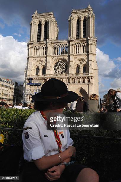 An boy scout waits for Pope Benedict XVI to arrive at the iconic Notre Dame cathedral to conduct an evening service, September 12, 2008 in Paris,...