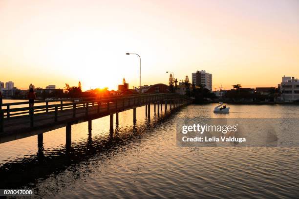 sunset in the lagoon of the violão - violão stock pictures, royalty-free photos & images