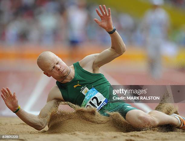 Hilton Langenhoven of South Africa competes in the final of the men's long jump F12 classification event at the 2008 Beijing Paralympic Games in...