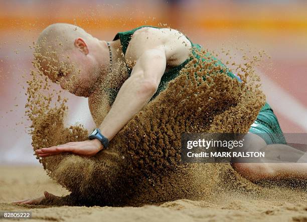 Hilton Langenhoven of South Africa competes in the final of the men's long jump F12 classification event at the 2008 Beijing Paralympic Games in...