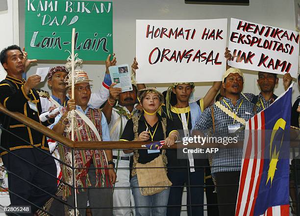 Indigenous people sing during a demonstration in Kuala Lumpur on September 13, 2008. About 150 indigenous people were prevented by the police from...