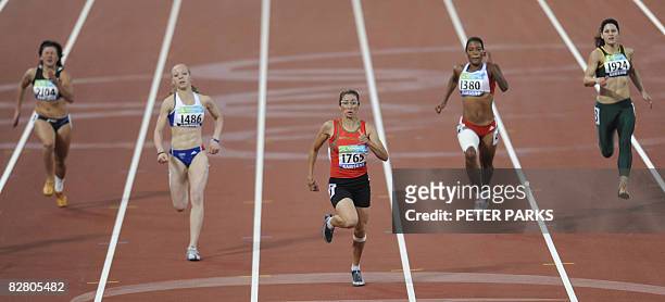 Sanaa Benhama of Morocco wins gold in the women's 200m T13 final during the 2008 Beijing Paralympic Games at the National Stadium in the Chinese...