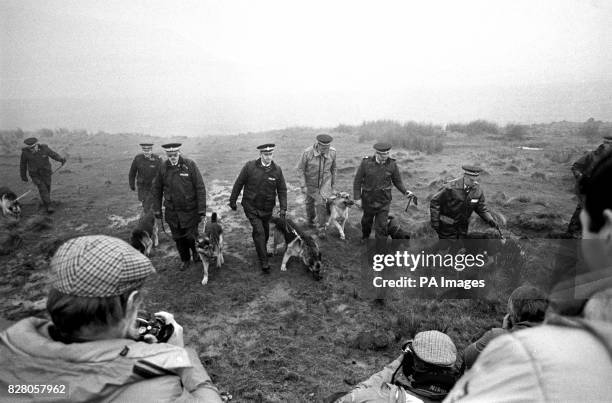 Police use specially trained sniffer dogs, on Saddleworth Moor, near Oldham. They are searching for the bodies of Pauline Reade and Keith Bennett who...