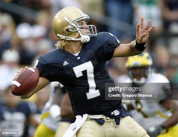 Jimmy Clausen of the Notre Dame Fighting Irish throws a first quarter pass while playing the Michigan Wolverines on September 13, 2008 at Notre Dame...