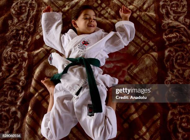 Year-old Syrian girl, Nur Setut, born in 2011 when Syrian civil war began, exercises karate with her own means in Aleppo, Syria on August 09, 2017....