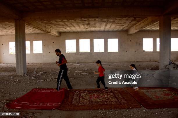 Year-old Syrian girl, Nur Setut, born in 2011 when Syrian civil war began, exercises karate with her own means in Aleppo, Syria on August 09, 2017....