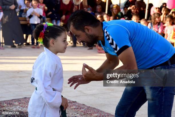 Year-old Syrian girl, Nur Setut, born in 2011 when Syrian civil war began, exercises karate with her own means in Aleppo, Syria on August 09, 2017....