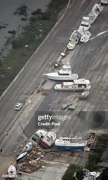 Boats sit on Interstate 45 after Hurricane Ike made landfall overnight September 13, 2008 in Galveston, Texas. Ike caused extensive damage along the...