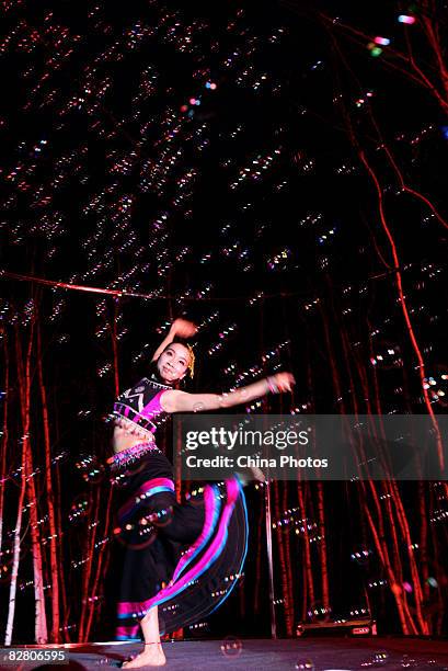 Dancer performs during an evening to mark the Mid-Autumn Festival on September 13, 2008 in Xian of Shaanxi Province, China. The Mid-Autumn Festival,...