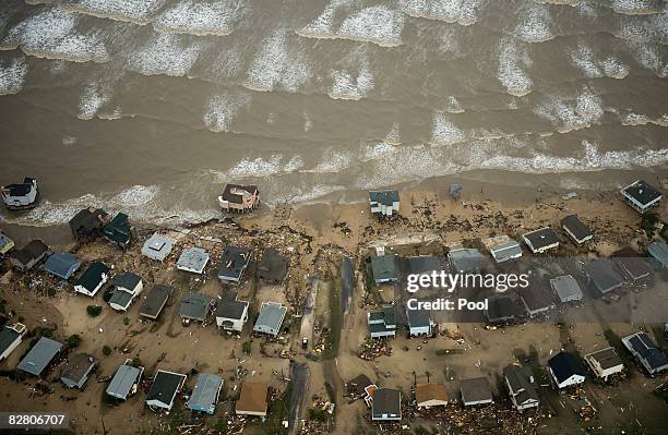 In this aerial photo, damaged beach front homes are seen on Galveston Island after the passing of Hurricane Ike September 13, 2008 in Galveston,...