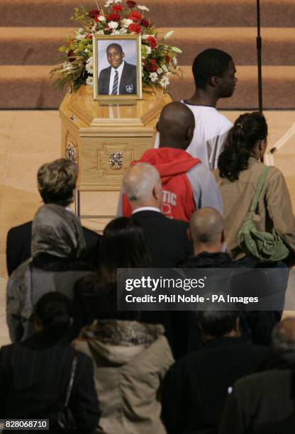 Mourners attend the funeral of murdered black teenager Anthony Walker Thursday August 25, 2005. The 18-year-old student was bludgeoned with an axe in...