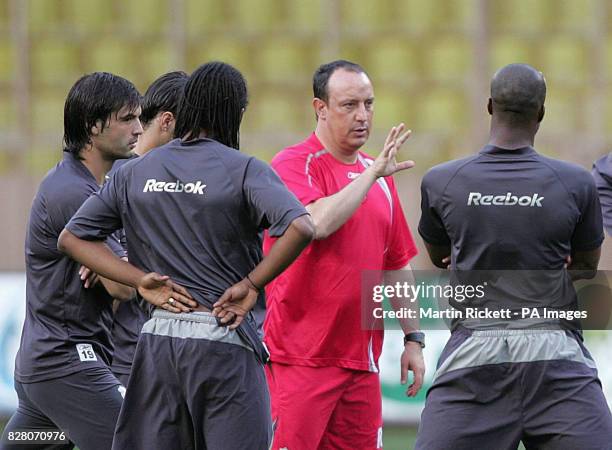 Liverpool manager Rafael Benitez talks to his players during a training session at Stade Louis II Stadium, Monte Carlo, Monaco, Thursday August 25,...