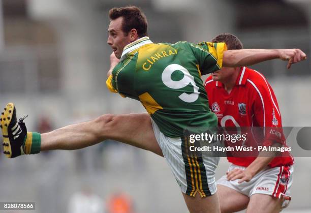 Kerry's William Kirby scores a point against Cork in the first-half of the GAA All Ireland Football semi-final, Sunday, 28 August at Croke Park,...