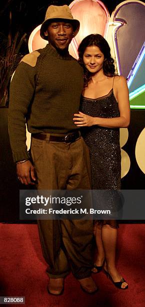 Actor Mahershalalhashbaz Ali and actress Jill Hennessy attend NBC's 75th Anniversary All-Star Reception January 9, 2002 in Los Angeles, CA.