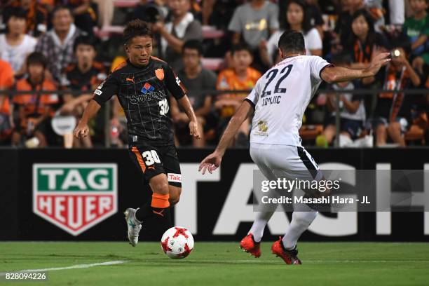 Shota Kaneko of Shimizu S-Pulse takes on Matej Jonjic of Cerezo Osaka during the J.League J1 match between Shimizu S-Pulse and Cerezo Osaka at IAI...