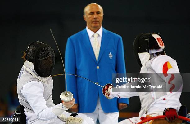 Hua Ye of China fences with Jana Saysunee of Thailand in the Individual Foil Category B Bronze Medal Match in the Wheelchair Fencing Competition at...