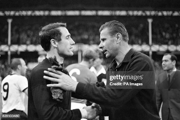 Goalkeeper Lev Yashin congratulates his counterpart, West Germany's Hans Tilkowski , on reaching the World Cup Final