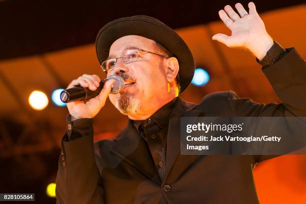 Panamanian musician, actor, and politician Ruben Blades performs onstage at Damrosch Park Bandshell, at Lincoln Center Out of Doors, New York, New...