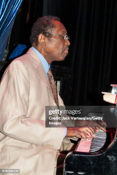 American Jazz musician John Hicks plays piano as he performs with the Ronnie Ben-Hur Sextet during the 2006 JVC Jazz Festival Press Conference at the...