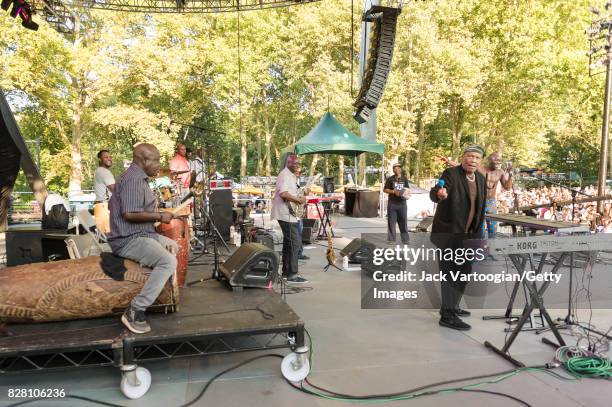 American Jazz musician Roy Ayers plays vibraphone with the band Egypt 80 during a performance at Central Park SummerStage, New York, New York, July...