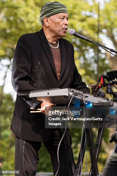 American Jazz musician and band leader Roy Ayers plays vibraphone as he leads his quartet during a performance at Central Park SummerStage, New York,...