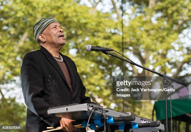 American Jazz musician and band leader Roy Ayers plays vibraphone as he leads his quartet during a performance at Central Park SummerStage, New York,...