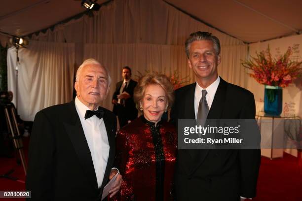 Actor Kirk and Anne Douglas pose with CTG Artistic Director Michael Ritchie during the grand re-opening gala for the Mark Taper Forum on September...
