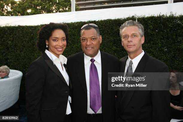 Actors Gina Torres and Laurence Fishburne with CTG Artistic Director Michael Ritchie pose during the grand re-opening gala for the Mark Taper Forum...