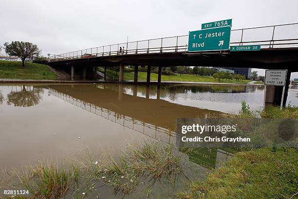 Interstate 10 is flooded and impassable following Hurricane Ike September 14, 2008 in Houston, Texas. Ike caused extensive damage along the Texas...