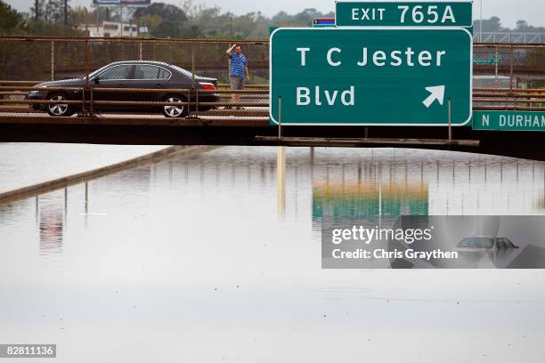 Interstate 10 is flooded and impassable following Hurricane Ike September 14, 2008 in Houston, Texas. Ike caused extensive damage along the Texas...